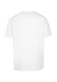 Fehér pamut póló rövid ujjal és kerek nyakkivágással; sima design, minta vagy grafika nélkül; puha anyagtextúra.