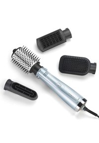 Electric hair styler with silver handle and four interchangeable black brush and nozzle attachments on white background.