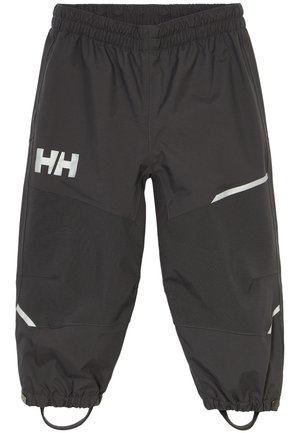 Pantalones impermeables negros con una cintura elástica, acentos reflectantes y un diseño ajustado. Cuenta con un cierre de tobillo ajustable.