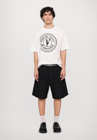 Versace Jeans Couture Camiseta estampada - white