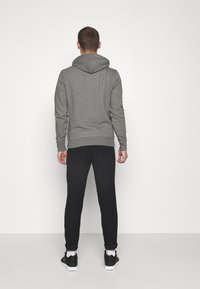 Tommy Hilfiger Jersey con capucha - mottled dark grey