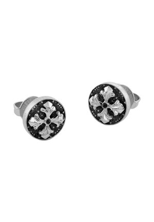 Paar runde silberne Manschettenknöpfe mit schwarzem Hintergrund und erhabenem, verzierten Kreuz in der Mitte.