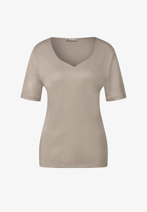 Beige T-shirt med V-hals og korte ærmer, lavet af blødt stof. Har et simpelt design, glat tekstur og en tætsiddende silhuet.