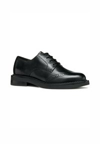 Scarpe stringate in pelle nera con finitura liscia, dettagli decorativi brogue, punta tonda e suola a contrasto.