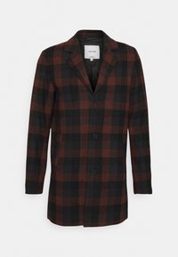 Káračkový vlněný kabát v černé a hnědé barvě, s klopovým límcem, třemi knoflíky a přiléhavým střihem. Hladká textura s jemným leskem.