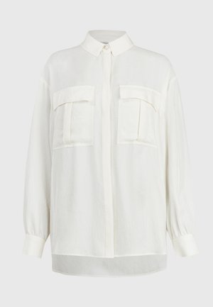 Langärmliges weißes Hemd mit Kragen, Knopfschluss und zwei Brusttaschen; leichtes Material mit einer weichen, strukturierten Oberfläche.