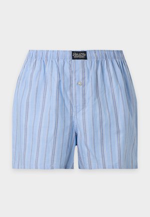 Boxer pour homme rayé bleu clair avec ceinture élastique et braguette à boutons, étiquette Polo Ralph Lauren pour vêtements de nuit au centre devant.