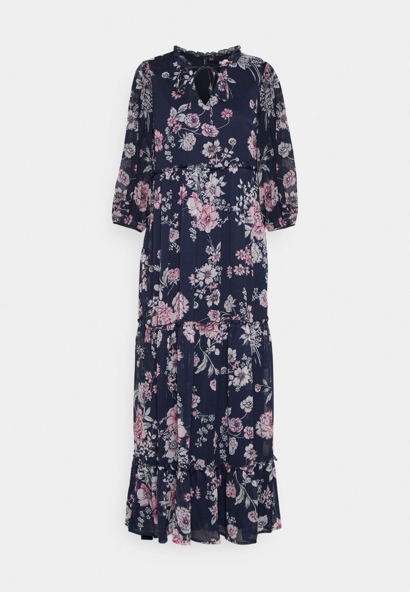 Robe longue fleurie bleu marine avec des fleurs roses et blanches. Elle présente un col à volants, des manches trois-quarts et une jupe à volants.