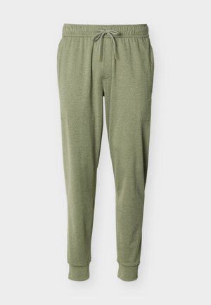 Απαλά χακί πράσινα παντελόνια τζόγκερ με ελαστική μέση, ρυθμιζόμενο κορδόνι, πλαϊνές τσέπες και ριγέ τελειώματα στους αστραγάλους.