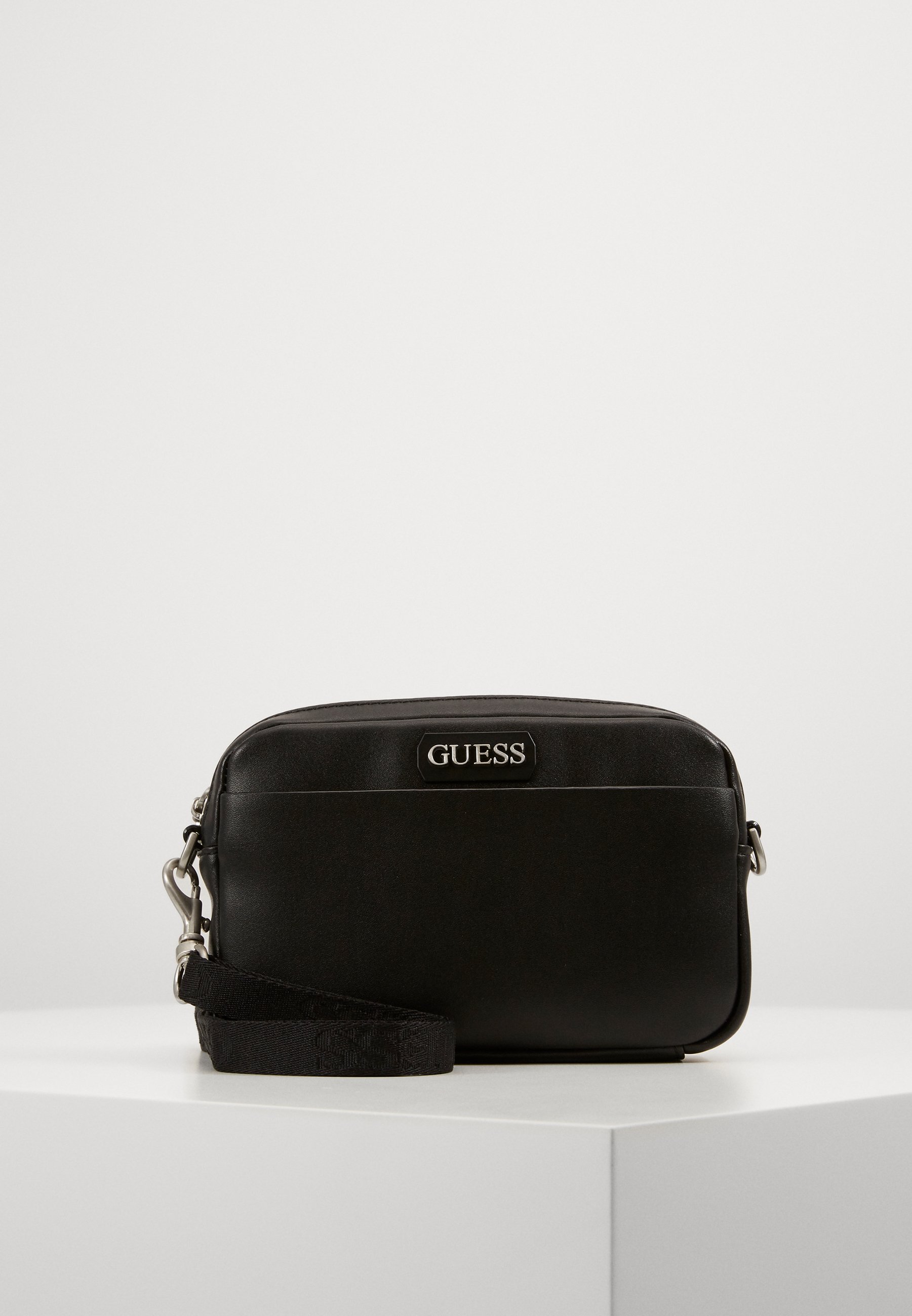 Guess DAN SMALL NECESSAIRE Skulderveske black Zalando.no Guess KAMRYN TOP ZIP Skulderveske black Zalando.no
