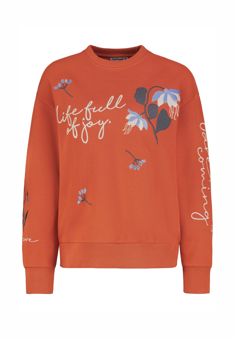 Oranger Pullover mit floralen Mustern und weißem Text "Leben voller Freude". Mit geripptem Kragen und Bündchen. Aus weichem Baumwollmaterial.