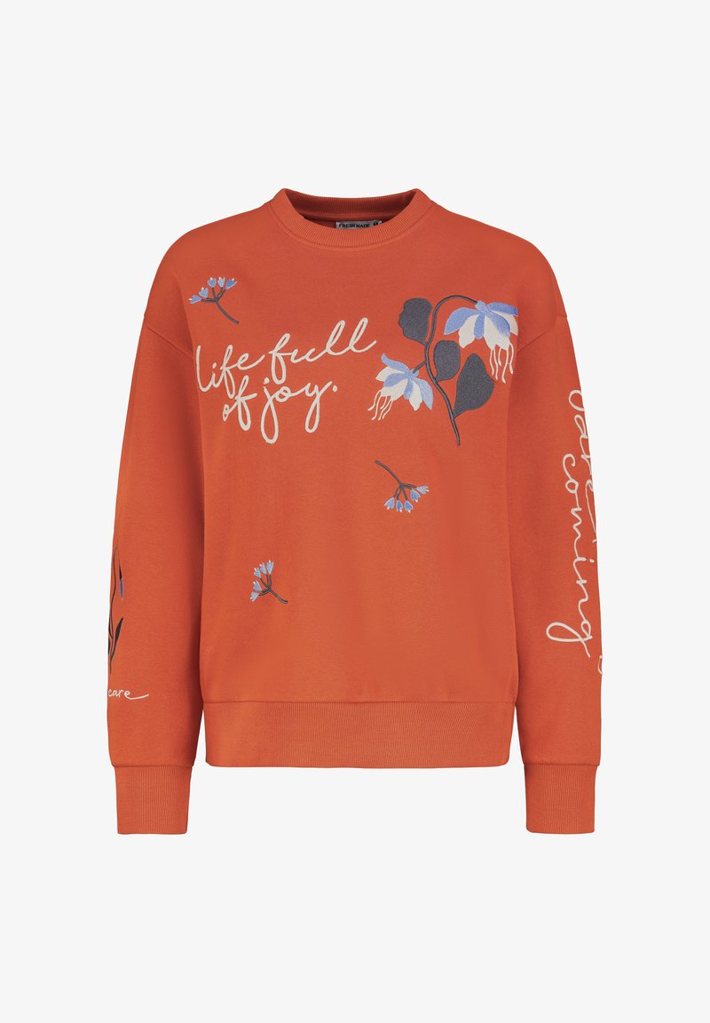 Orange sweatshirt with floral patterns and white text reading "life full of joy." Features a ribbed collar and cuffs. Soft cotton material.
