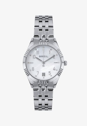 Montre en acier inoxydable argenté avec un cadran rond en nacre, des index en diamants et un affichage de la date. Elle se distingue par un bracelet à maillons.