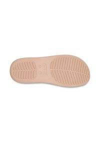 Light pink rubber shoe sole with textured tread pattern, featuring circular and linear grooves for traction. Marked with brand logo and size.