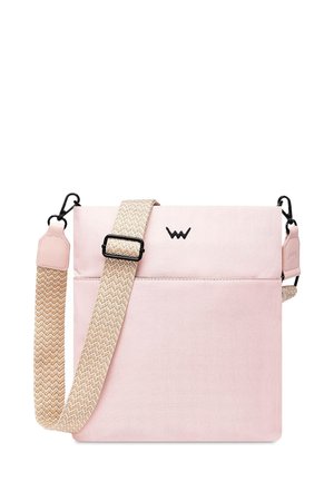 Pink fabric crossbody bag with a textured, woven strap. Features adjustable strap, black hardware, and a logo on the front.