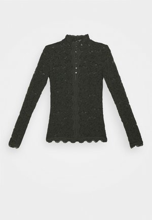 Top de encaje negro de manga larga con cuello alto, con cierre de botones y bordes ondulados. Patrón floral en toda la tela.