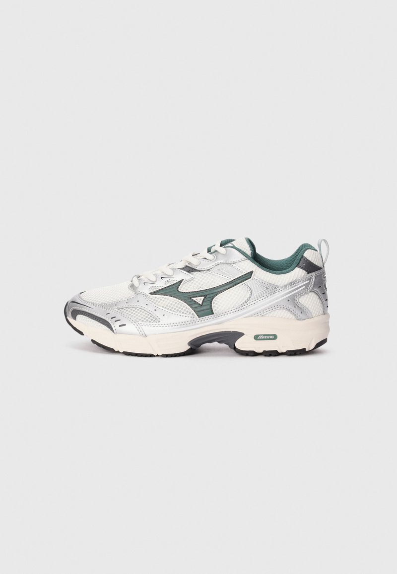 White and silver athletic shoe with green accents, mesh upper, and padded collar. Features a textured sole for traction.
