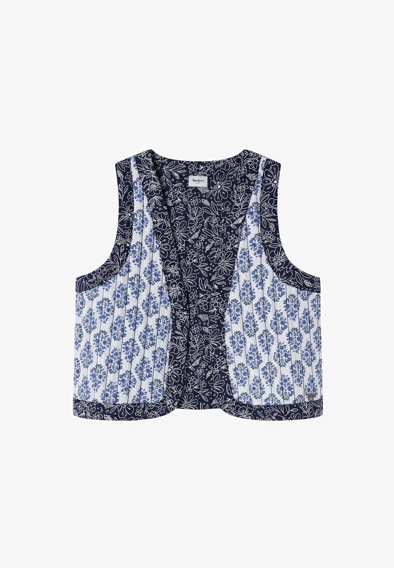 Kreklus bez piedurknēm ar tumši ziliem ziedu rakstiem vienā pusē un kontrastējošu baltu un zilu svītrotu rakstu otrajā pusē. Vieglas audums.