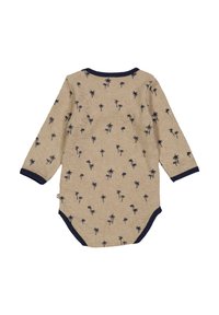 Beige overal s dlouhým rukávem s potiskem námořnických palm a kontrastním námořnickým lemem na manžetách a výstřihu. Měkká texturovaná tkanina.