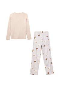 Haut à manches longues rose clair et pantalon de pyjama gris à motifs avec des imprésions de desserts et de chocolat. Tissu doux, design décontracté.