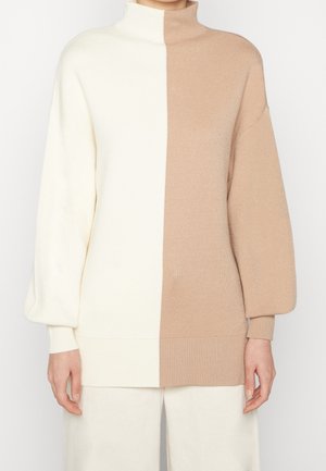 Stickad tröja - beige