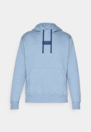 Light blue hoodie made of soft fabric, featuring a kangaroo pocket, navy drawstrings, and a rectangular label with "PARIS SAINT-GERMAIN."