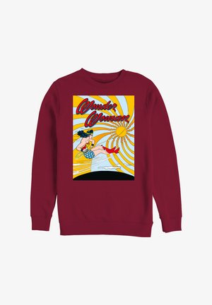 Bordowa bluza z kolorową grafiką przedstawiającą "Wonder Woman". Projekt zawiera superbohaterkę w niebiesko-czerwonym stroju na tle jasnego promieniowania słońca.