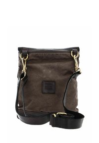 Brown fabric crossbody bag with a textured surface, leather accents, and gold-tone hardware; features an adjustable strap and logo patch.