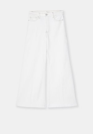 FRAME LE PALAZZO CROP RAW FRAY - Flared-farkut - white