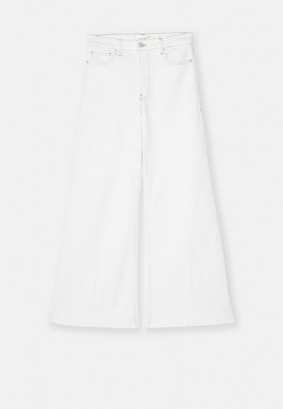 FRAME LE PALAZZO CROP RAW FRAY - Flared Jeans - white