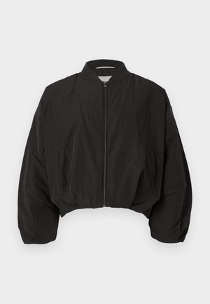 Black cropped bomber jacket with a zip front, ribbed collar, and loose, voluminous sleeves. Made from smooth fabric with no visible patterns.