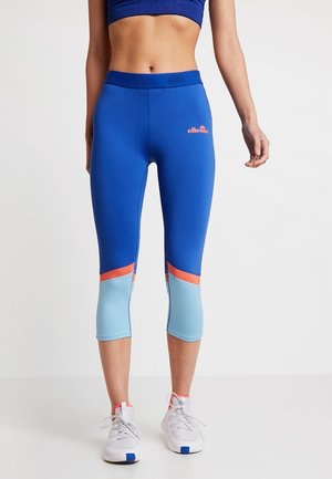 Blue capri leggings with light blue and coral accents, made of stretchy material. Features logo at waist and color-blocked design.