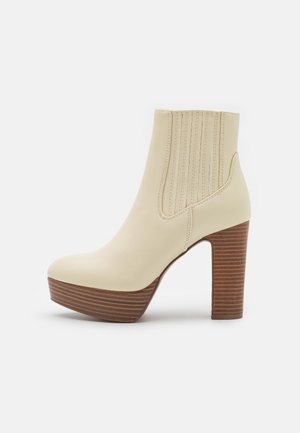 Bottines à talons hauts - off-white