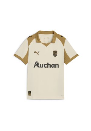 Polo shirt crema con accenti dorati e logo PUMA. Presenta scollo a V, maniche corte e testo "Auchan". Il badge mostra "RCL" e 120 anni.
