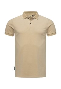 Beige polo shirt with short sleeves, collar, and three buttons. Features a textured fabric and a small label on the side.