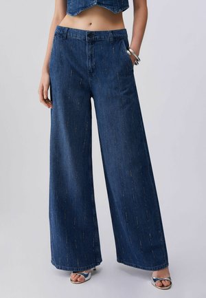 WITH RHINESTONES - Jeans a zampa - light blue