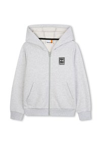 Sweatshirt à capuche gris à zip en matériau polaire, avec une poche avant, des poignets côtelés et un patch logo Timberland sur la poitrine.