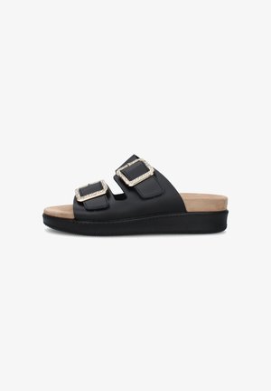Sandalo nero slip-on con due ampie fasce con grandi fibbie bordate di strass e soletta imbottita beige su suola piatta.