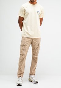 Butcher of Blue T-shirt print - beige grey