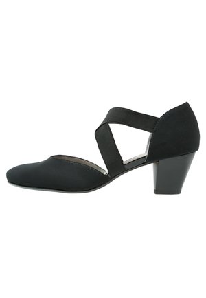Black heeled shoe with a textured fabric upper, pointed toe, and crisscross elastic straps; features a sturdy block heel.