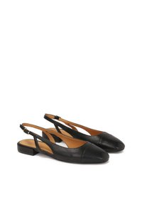Black leather slingback shoes with a low block heel, almond-shaped toe, and minimalistic cutout design. Adjustable buckle strap for fit.