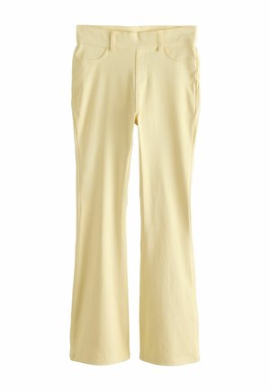 Svetložlté nohavice s rovnými nohavicami, prednými a zadnými vreckami, slučkami na opasok a hladkou textúrou látky.