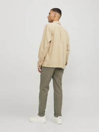 Jack & Jones JPSTMARCO JJFURY ANA - Chino hlače - aloe