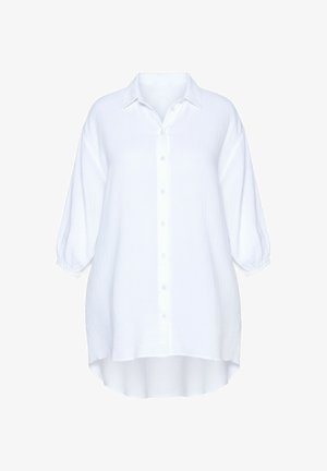 Weißes übergroßes Hemd mit strukturiertem Stoff, klassischem Kragen und weiten Ärmeln sowie einem hohen-niedrigen Saum.