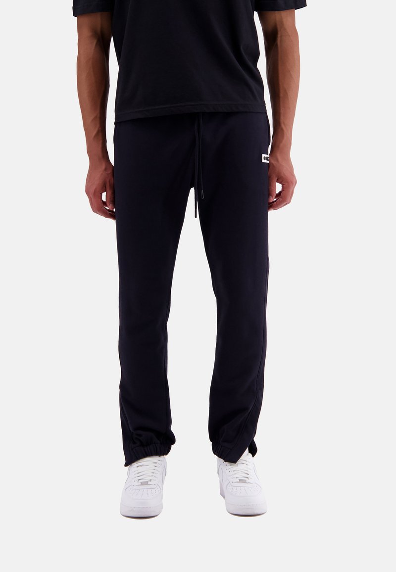KOQS Tracksuit bottoms black onyx/black Zalando.de