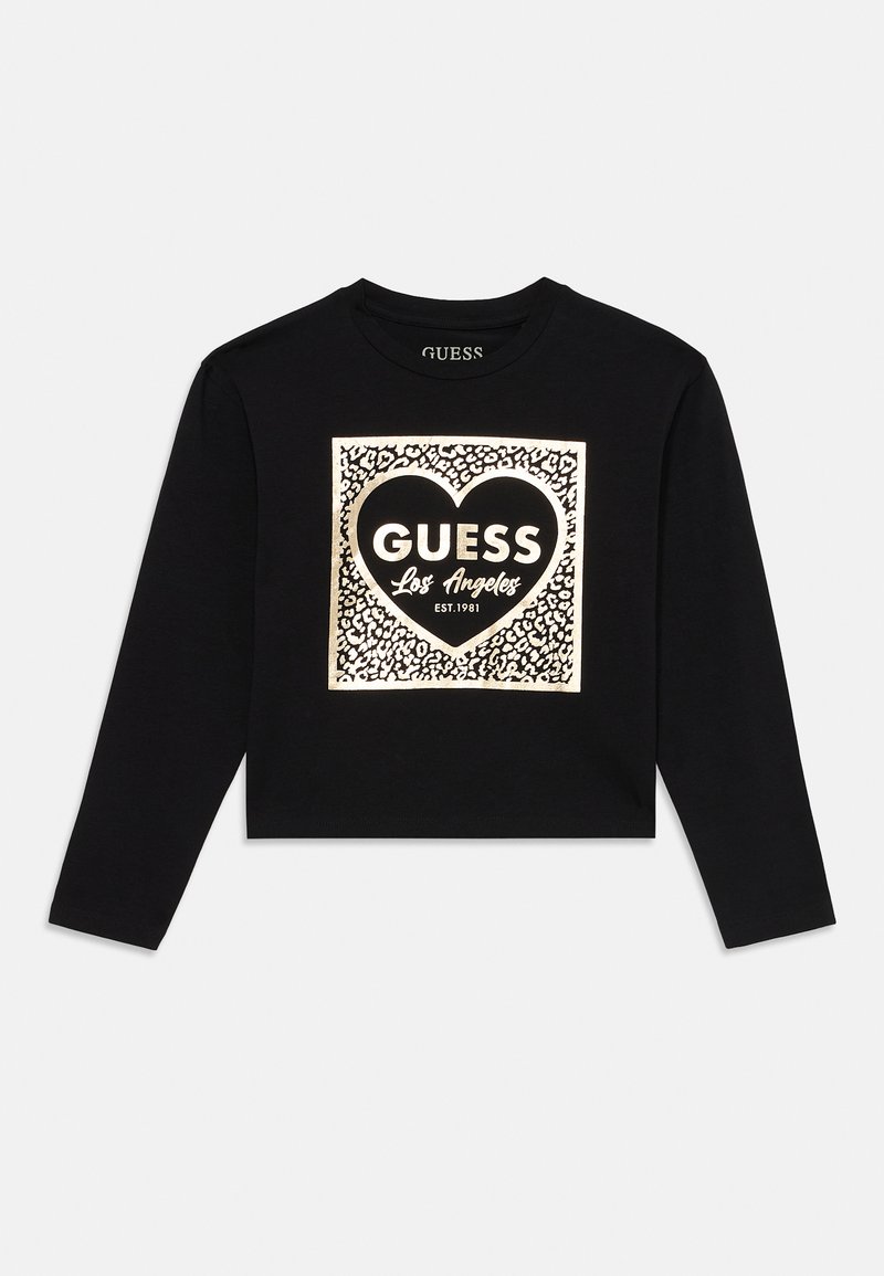 Černá dlouhá rukávová zkrácená košile s kovovým leopardím potiskem a čtvercem, který obsahuje srdce a text "GUESS Los Angeles EST. 1981" na přední straně.
