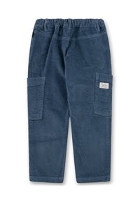 Blaue Cordhosen mit elastischem Bund, zwei Seitentaschen und einem kleinen weißen Aufnäher auf der rechten Tasche.