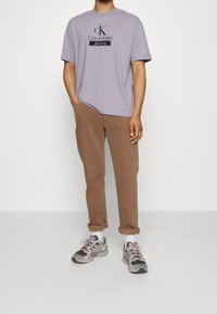 Calvin Klein Jeans Print T-shirt - purple