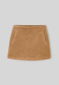 Jupe mini en velours côtelé de couleur brun clair avec une texture lisse, dotée de deux poches latérales et d'une taille ajustée. L'ourlet est légèrement incurvé.