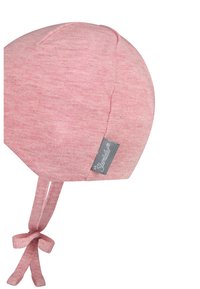 Pink cotton infant cap with a rounded shape, soft texture, and ties for secure fit. Features a small gray logo tag on the side.